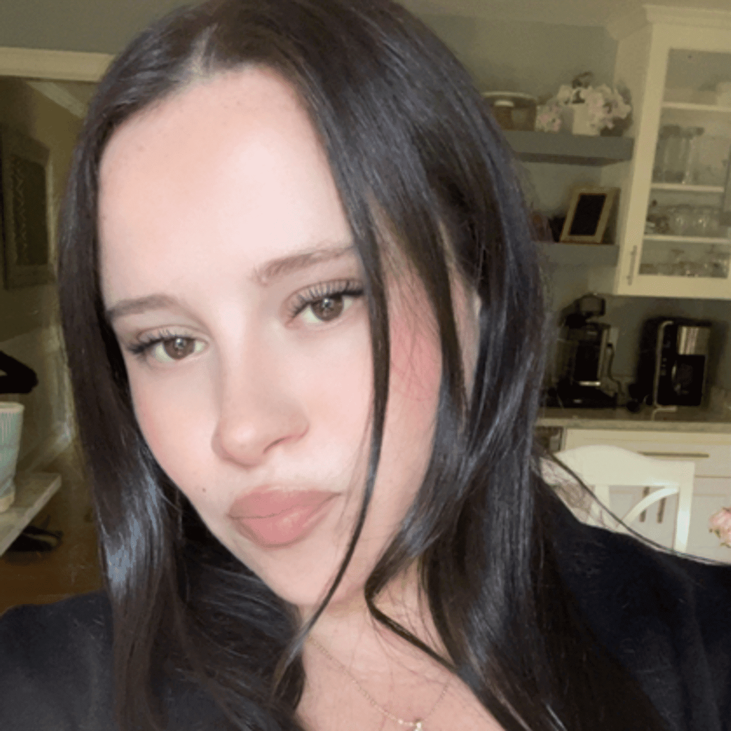 Portrait of Beverly Donnellan, a professional stylist at Invidia Salon and Spa, showcasing their expertise and style.