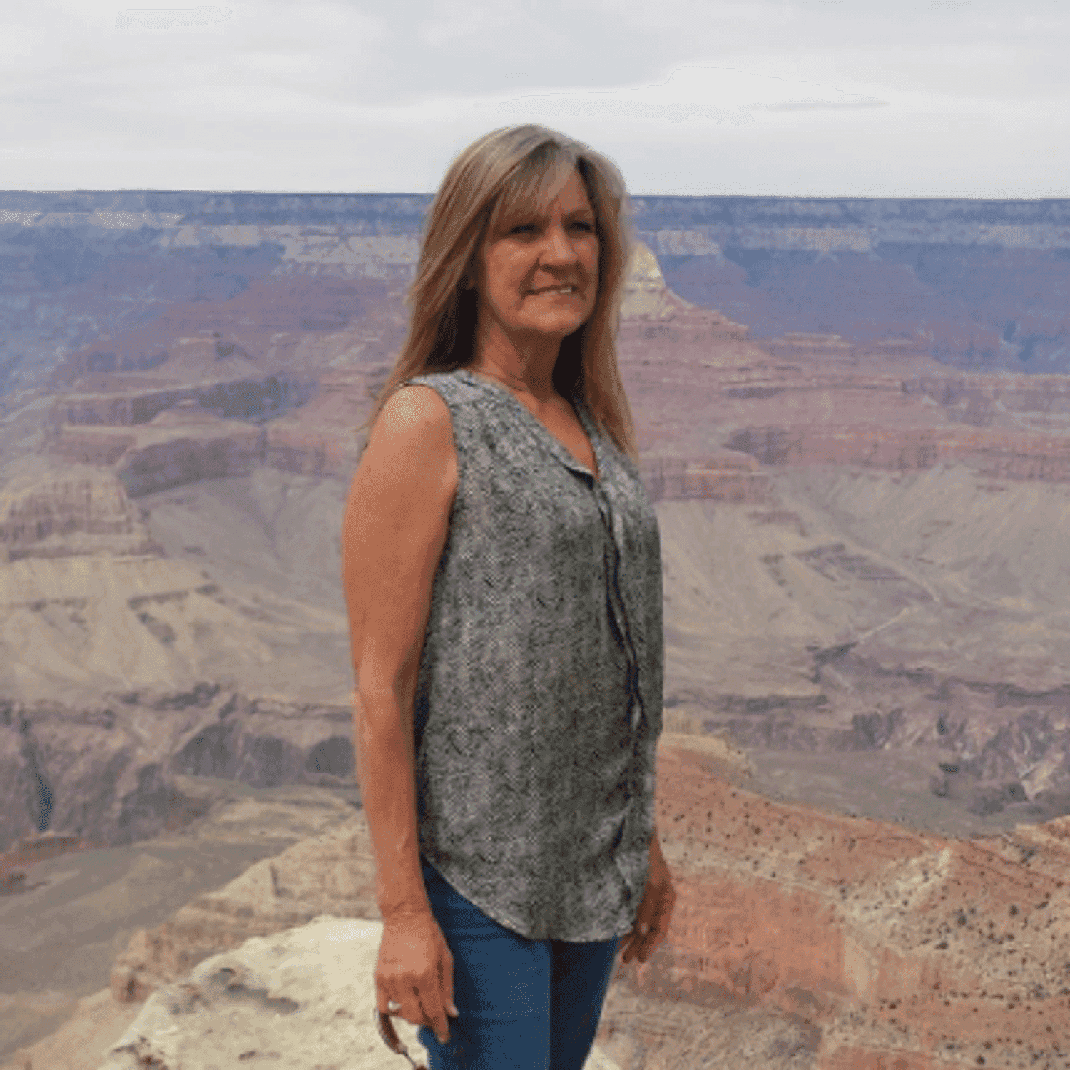 Portrait of Colleen De Vincentis, a professional stylist at Invidia Salon and Spa, showcasing their expertise and style.