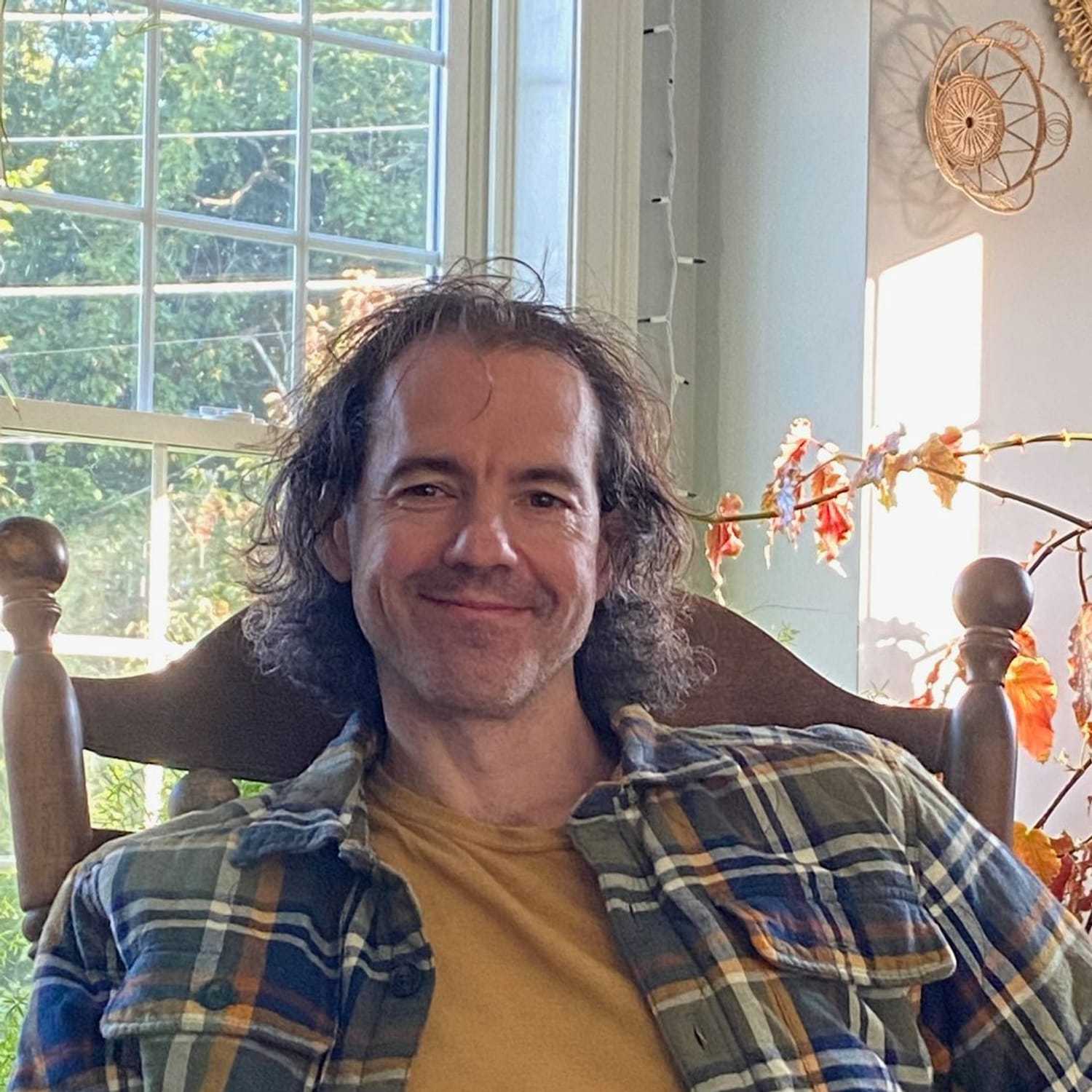 Portrait of Orion Nemeth, a professional stylist at Invidia Salon and Spa, showcasing their expertise and style.