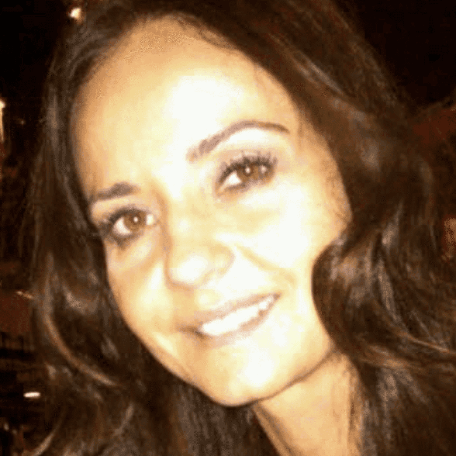 Portrait of Jasmin Patzleiner, a professional stylist at Invidia Salon and Spa, showcasing their expertise and style.