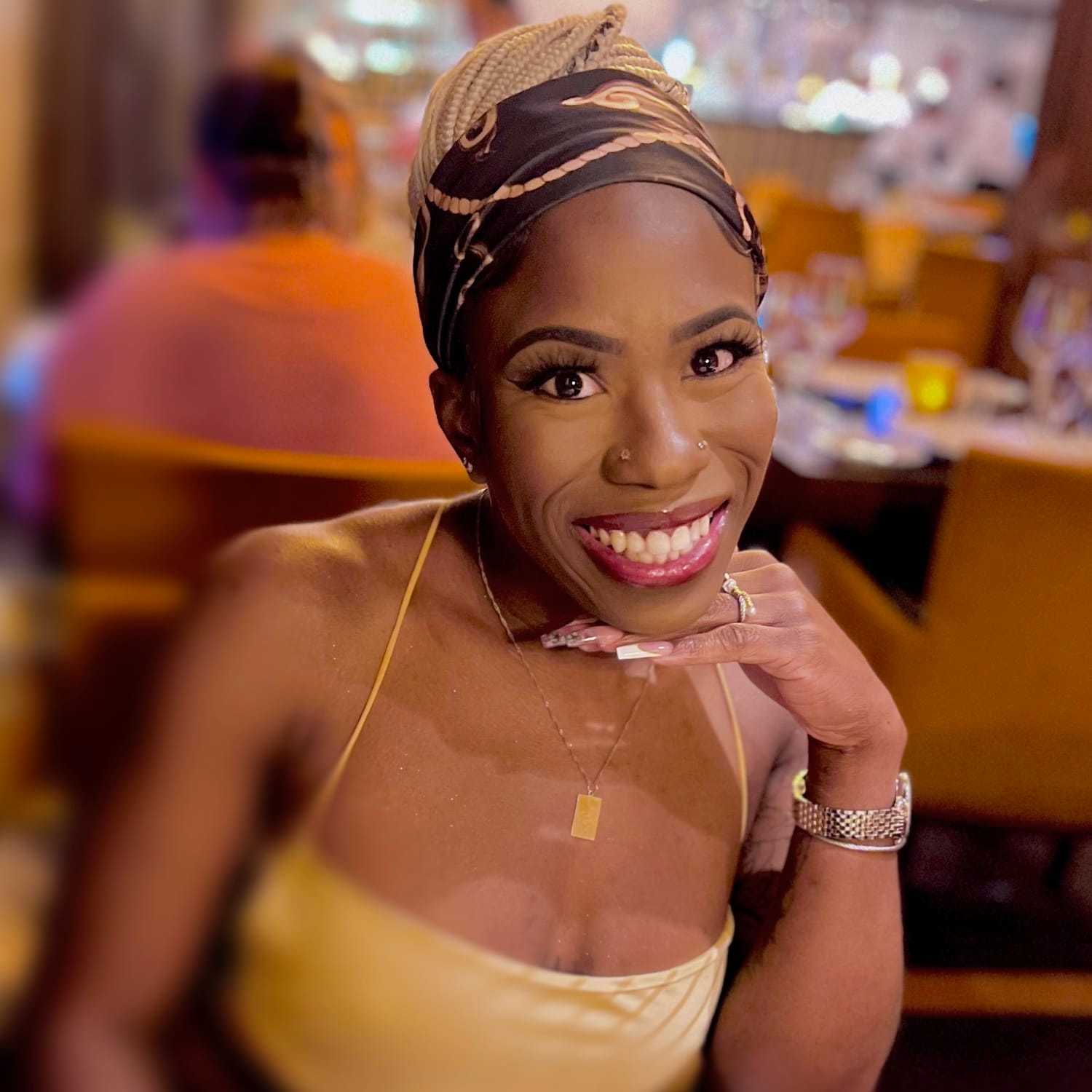 Portrait of Bianca, a professional stylist at Invidia Salon and Spa, showcasing their expertise and style.