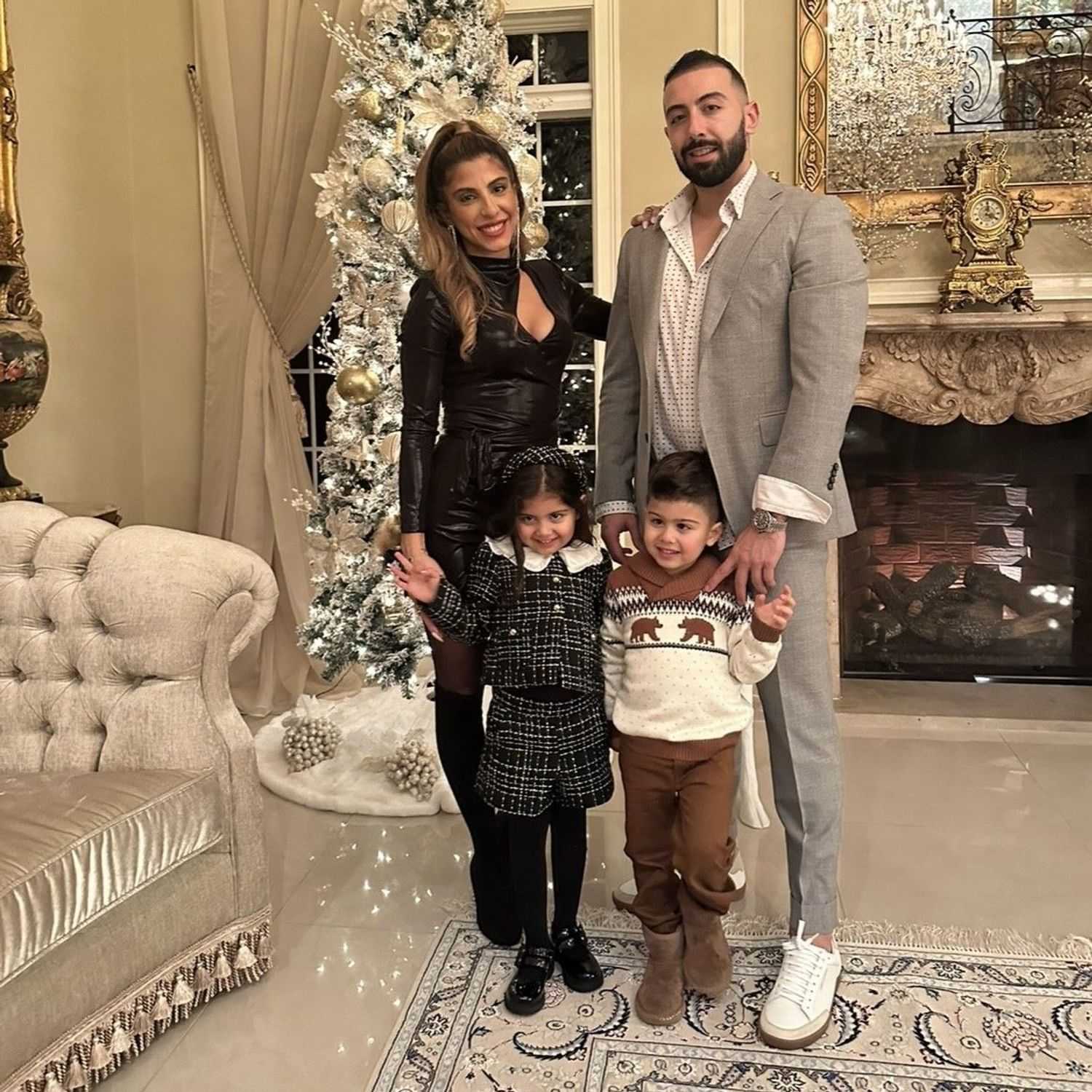 Portrait of Jennifer Sakhat, a professional stylist at Invidia Salon and Spa, showcasing their expertise and style.