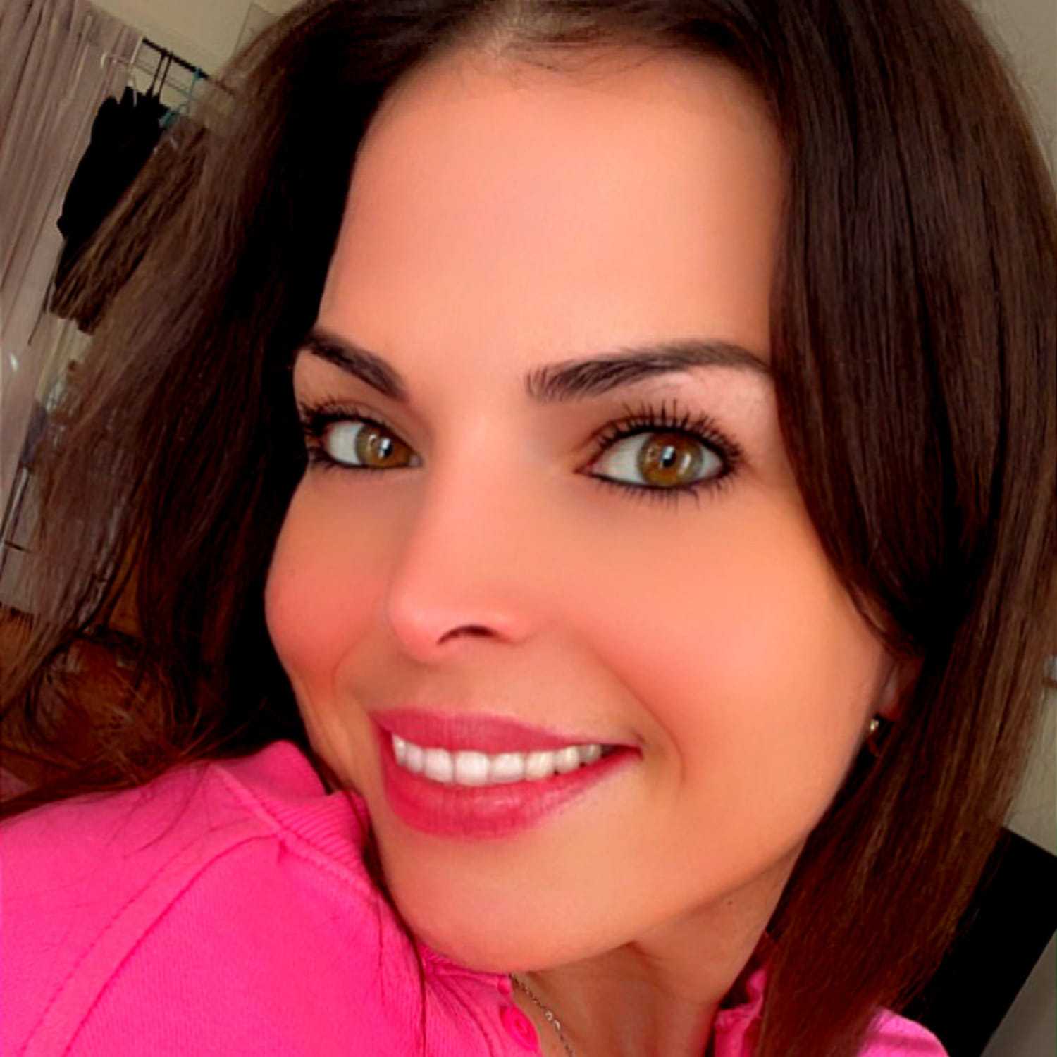 Portrait of Katelyn, a professional stylist at Invidia Salon and Spa, showcasing their expertise and style.