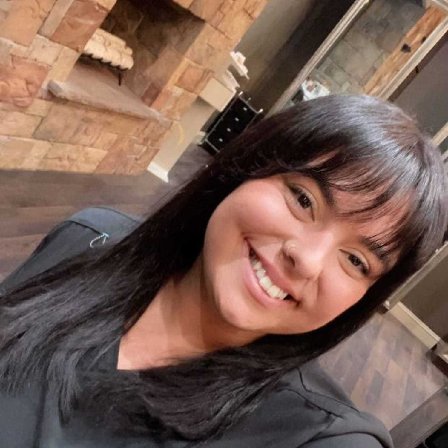 Portrait of Shannon Killala, a professional stylist at Invidia Salon and Spa, showcasing their expertise and style.